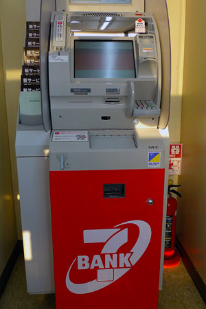 Seven Bank International ATM inside a Japanese Seven Eleven convenience store.
