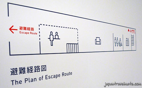 Japanese emergency sign in a capsule hotel
