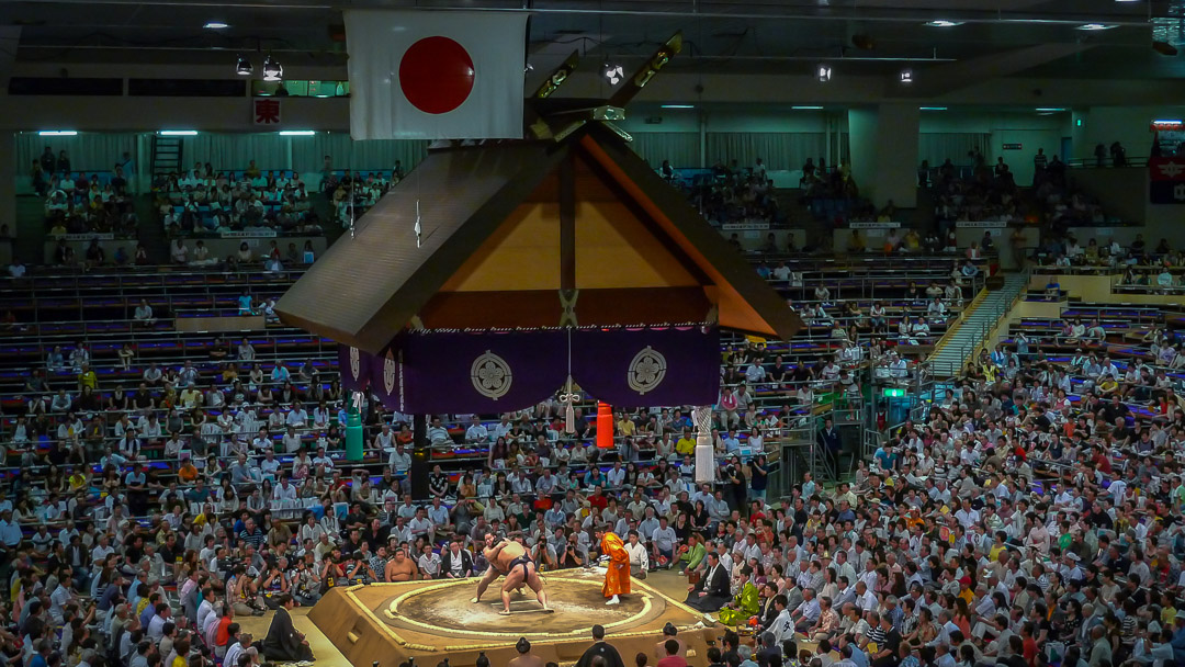 A sumo bout taking place at the Nagoya Sumo Honbasho at the Aichi Prefectural Gymnasium