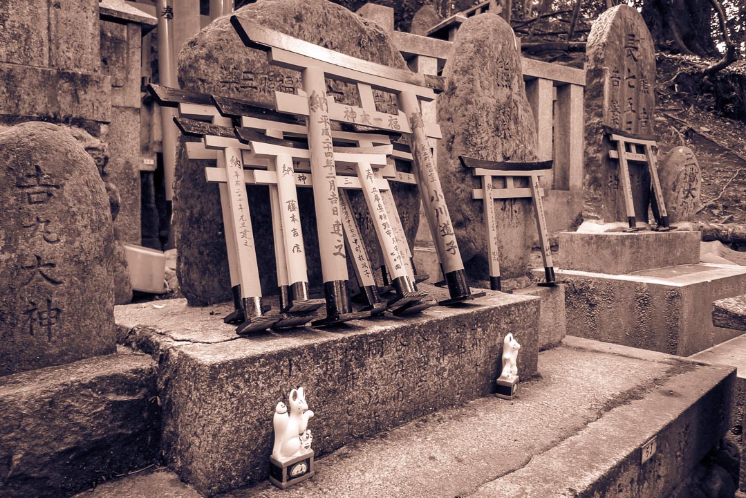 Black and white photo of a grave at Fushimi Inari Shrine